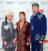 DUBAI, UNITED ARAB EMIRATES - DECEMBER 10: Aisholpan Nurgaiv, Almagul Kuksygyen and Nurgaiv Rys attend "The Eagle Huntress" red carpet during day four of the 13th annual Dubai International Film Festival held at the Madinat Jumeriah Complex on December 10, 2016 in Dubai, United Arab Emirates. (Photo by Neilson Barnard/Getty Images for DIFF)